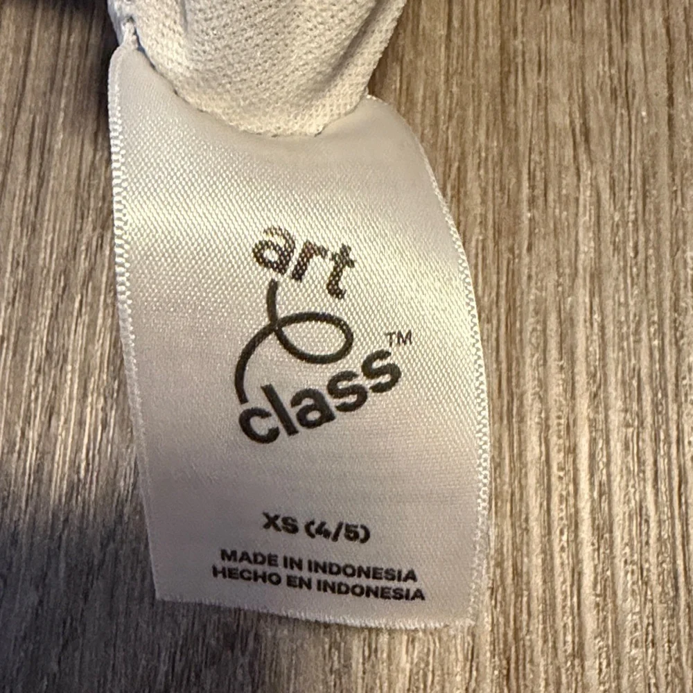 art class White Clothing Care Tag with Black Logo